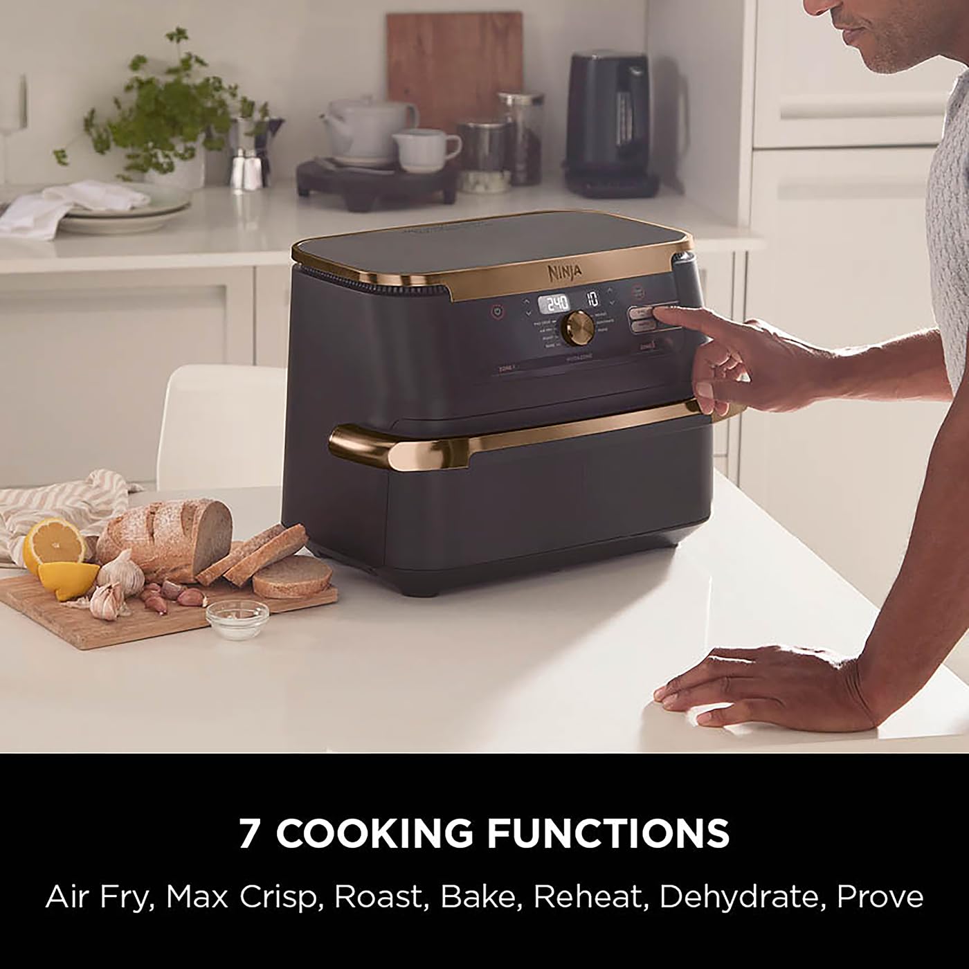 Ninja foodi multi-cooker on a kitchen counter with a person interacting with it, surrounded by kitchen items.