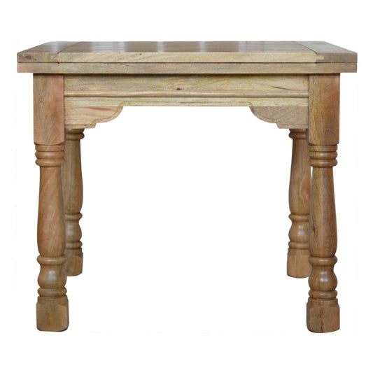Wooden table with turned legs on a white background