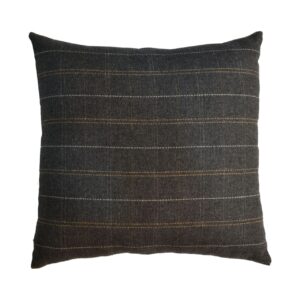Plaid patterned pillow on a white background